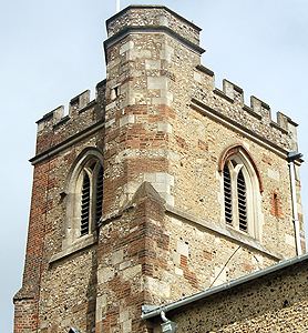 The west tower showing different materials used in repairs June 2012